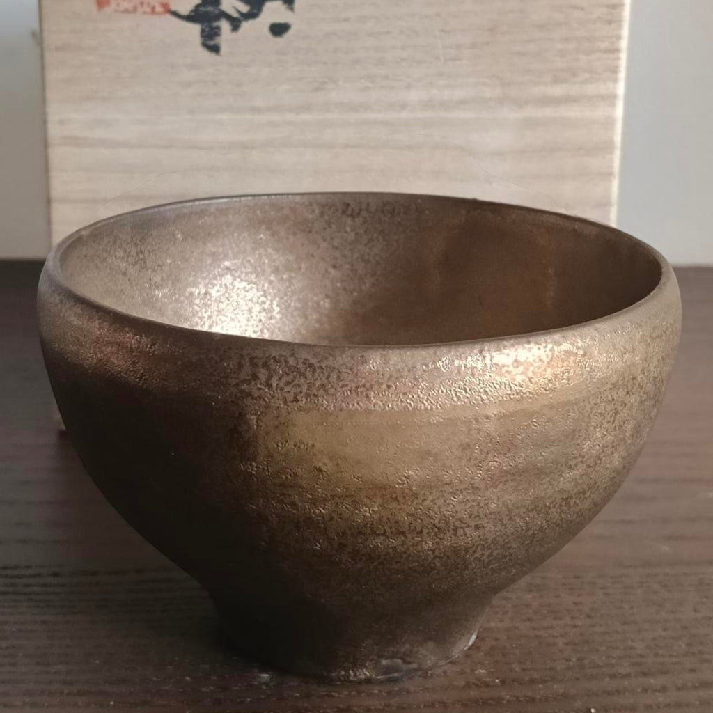 Polo Express "Earth Gold" Chawan tea bowl with a metallic gold and copper glaze, presented with its wooden box.